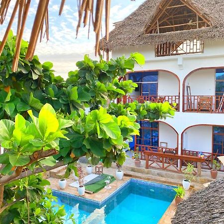 Utulivu Bungalow Нунгви Экстерьер фото