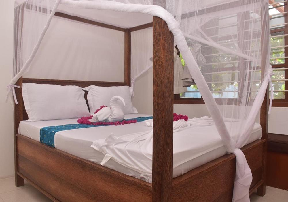 Utulivu Bungalow Нунгви Экстерьер фото