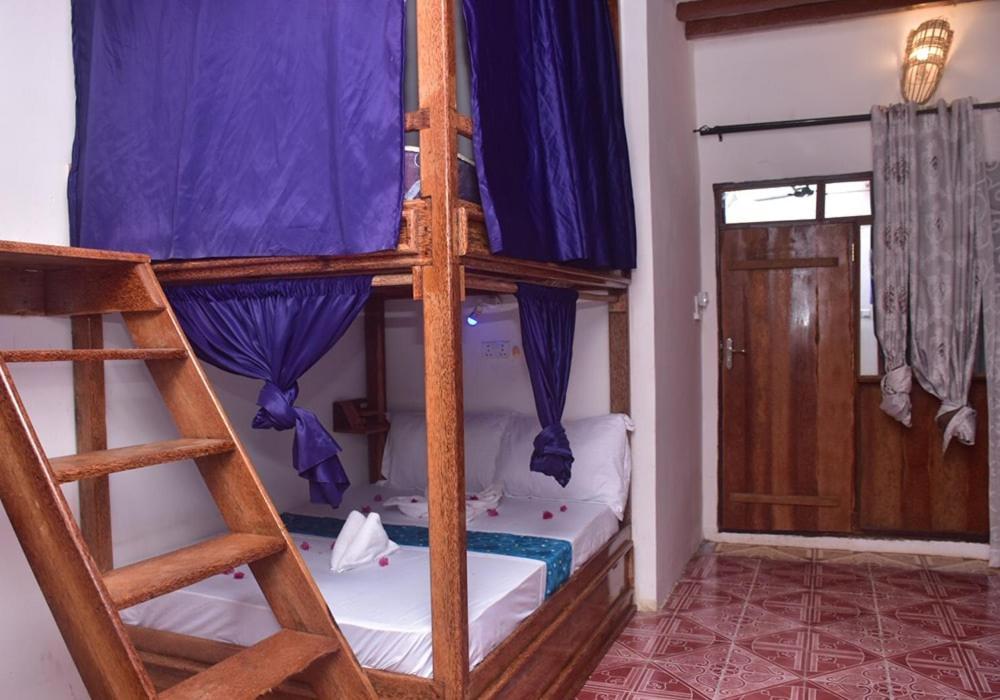 Utulivu Bungalow Нунгви Экстерьер фото