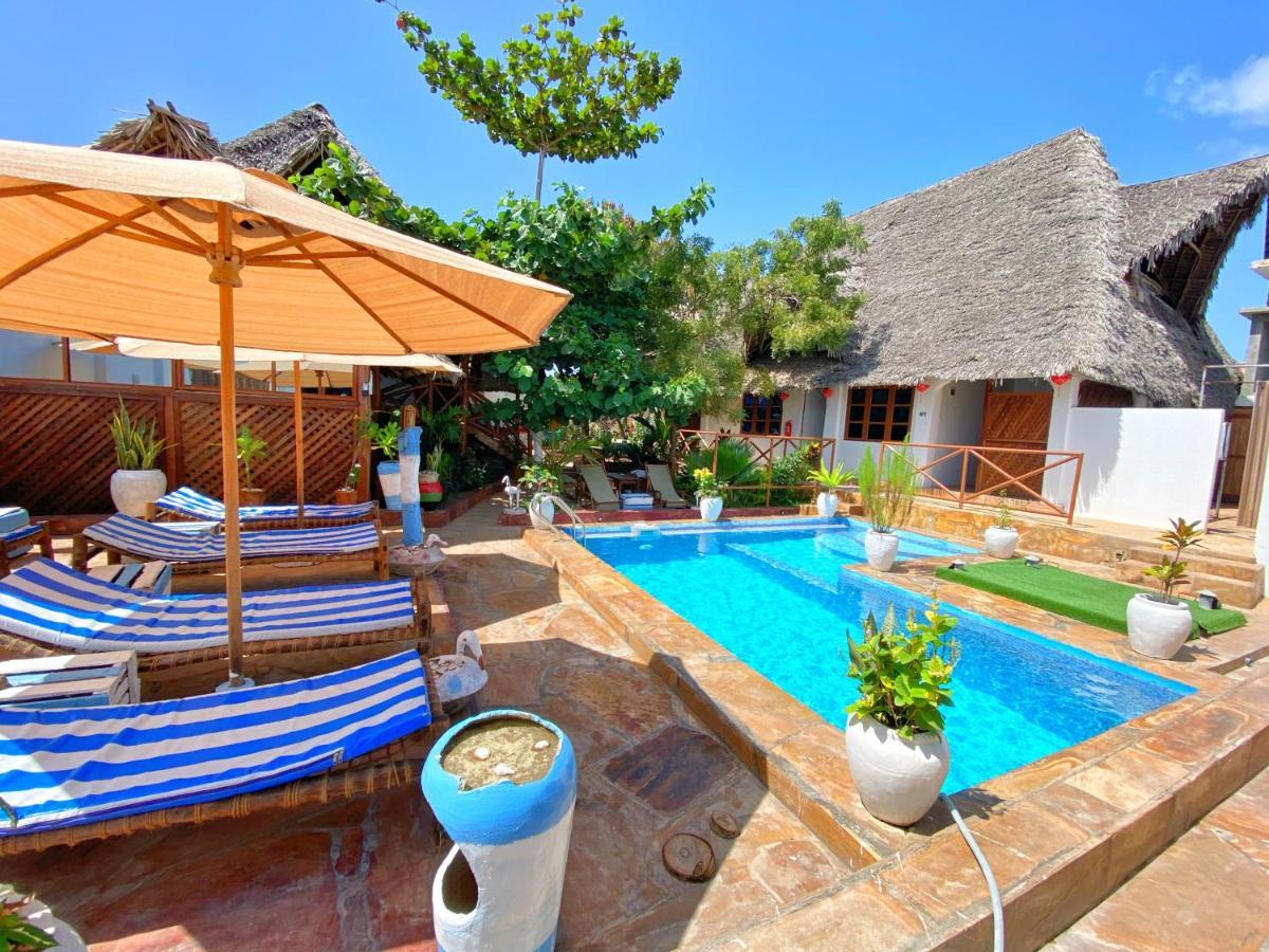 Utulivu Bungalow Нунгви Экстерьер фото