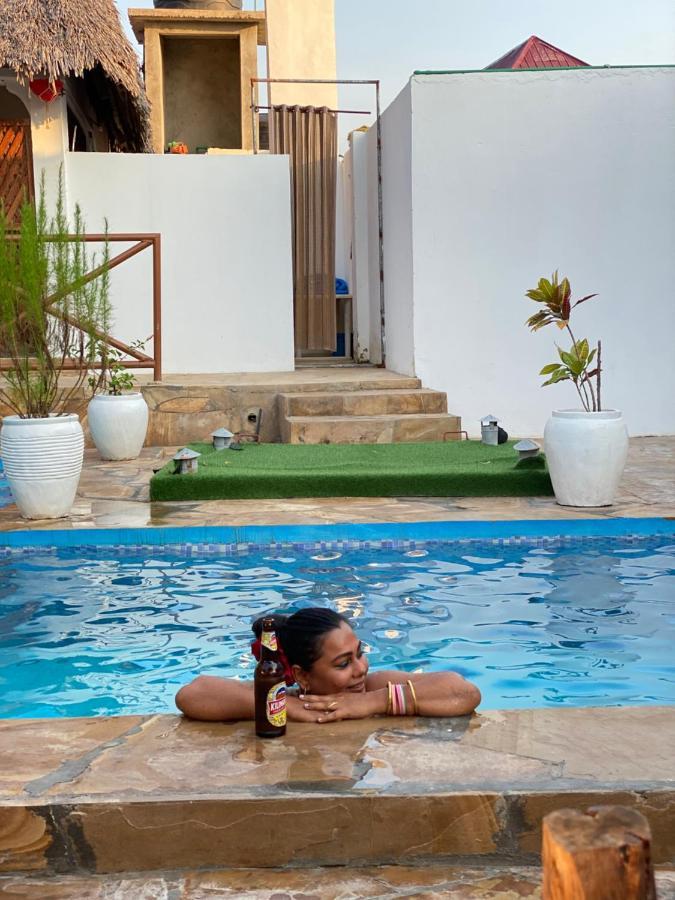 Utulivu Bungalow Нунгви Экстерьер фото