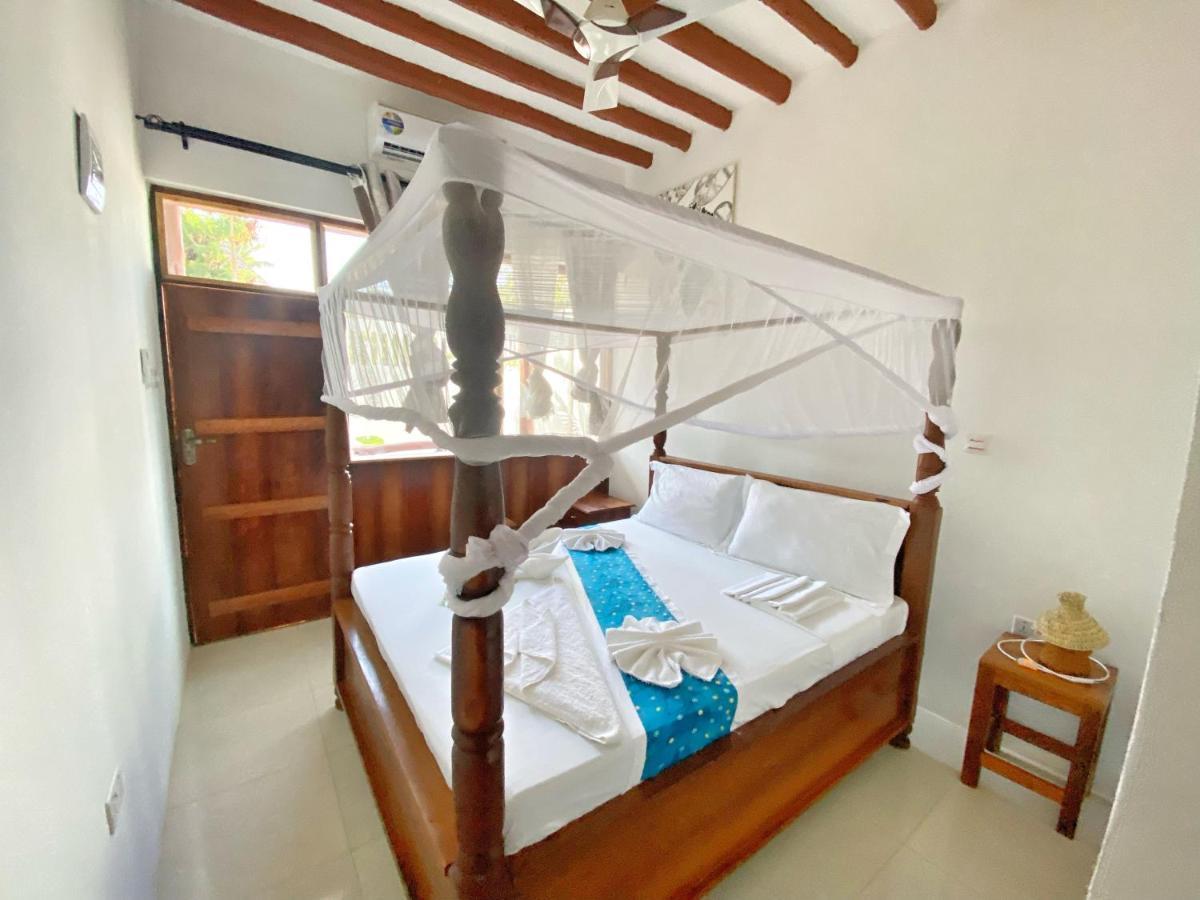 Utulivu Bungalow Нунгви Экстерьер фото