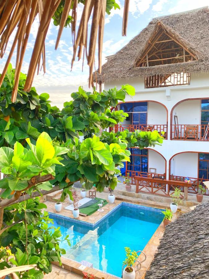 Utulivu Bungalow Нунгви Экстерьер фото