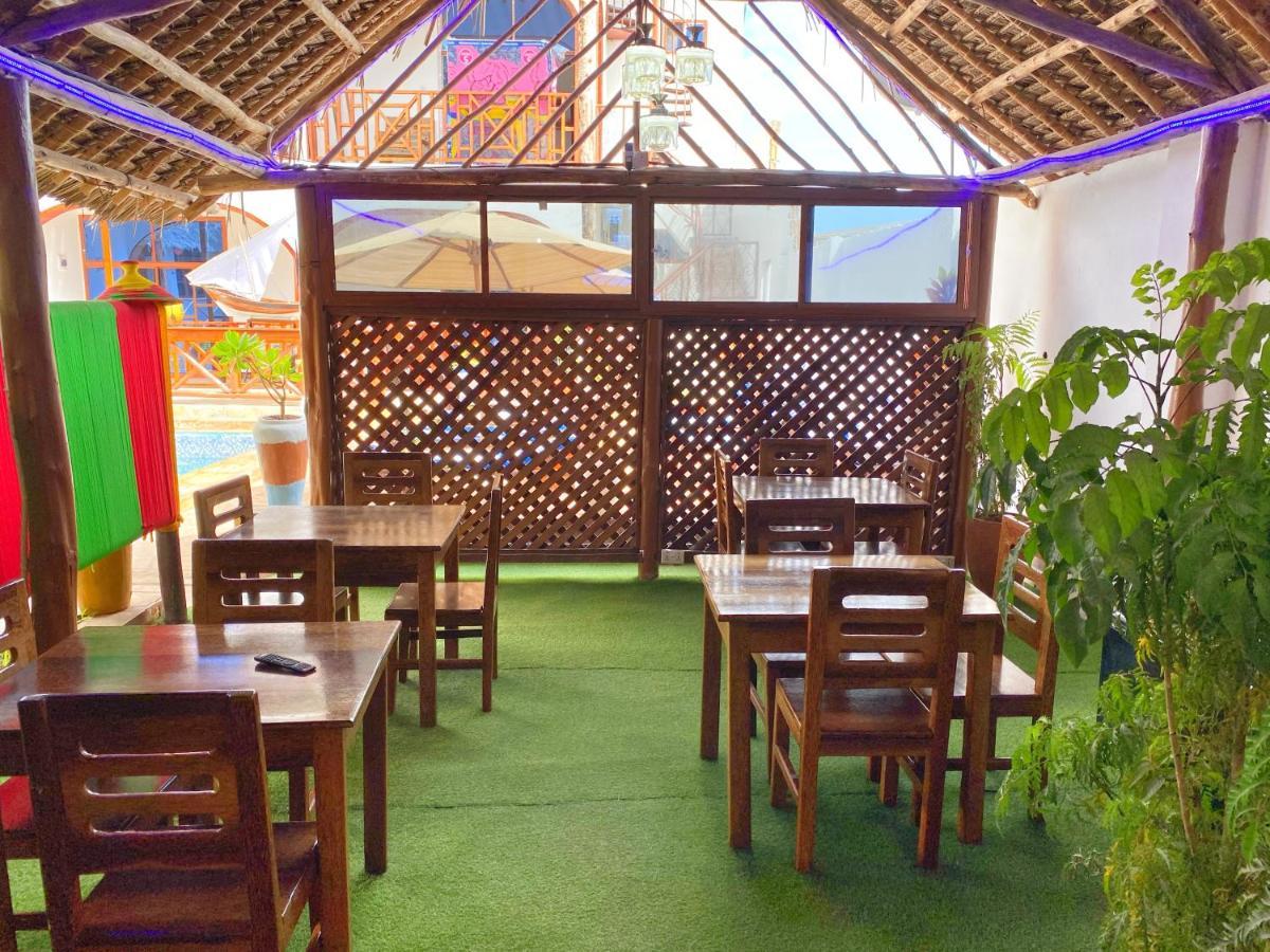 Utulivu Bungalow Нунгви Экстерьер фото