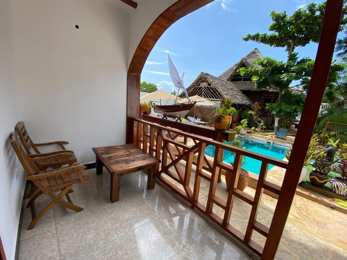 Utulivu Bungalow Нунгви Экстерьер фото