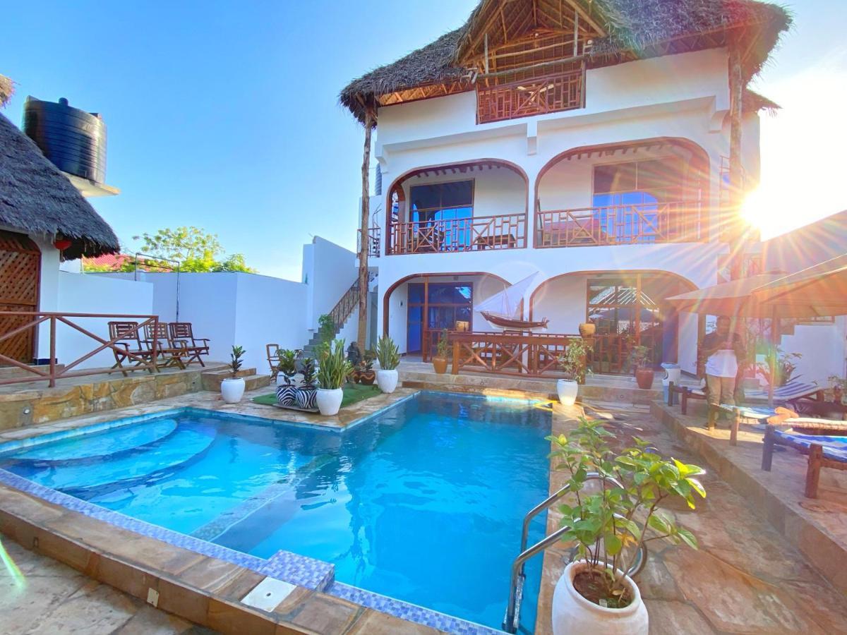 Utulivu Bungalow Нунгви Экстерьер фото