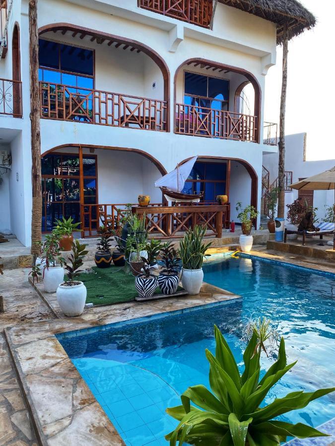 Utulivu Bungalow Нунгви Экстерьер фото
