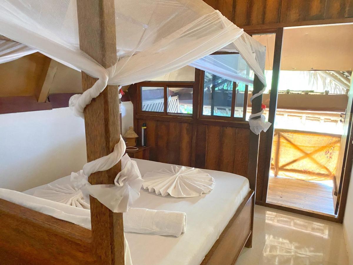 Utulivu Bungalow Нунгви Экстерьер фото