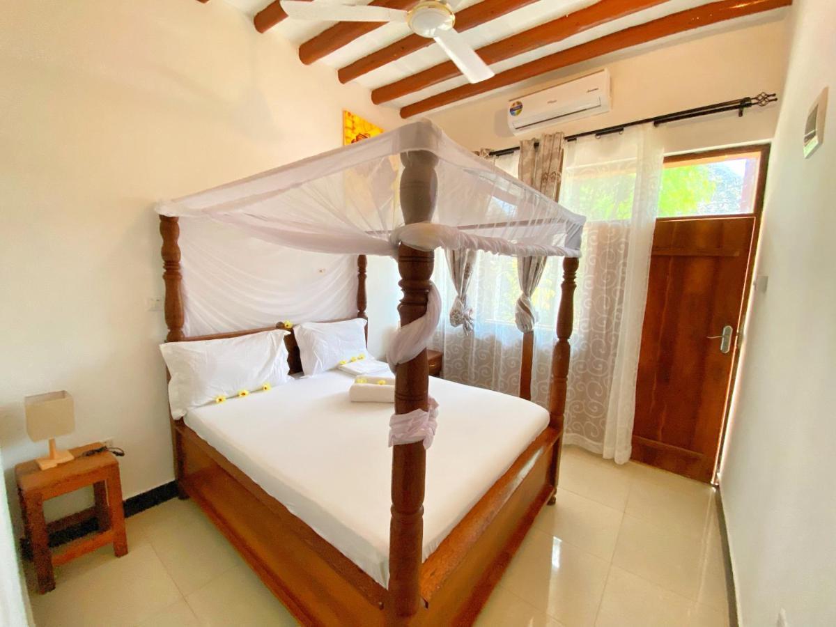 Utulivu Bungalow Нунгви Экстерьер фото