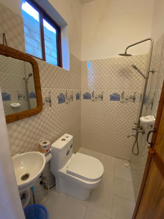 Utulivu Bungalow Нунгви Экстерьер фото