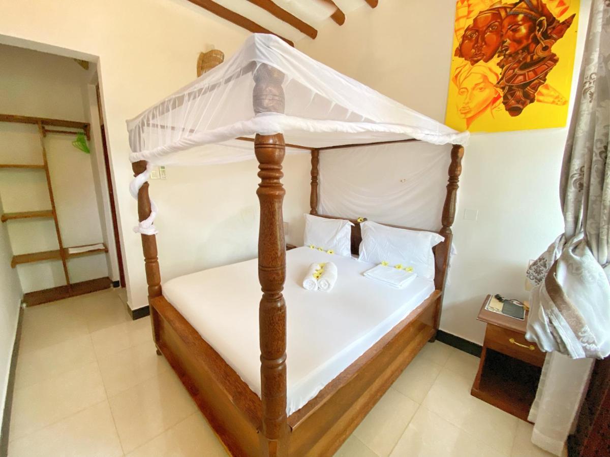 Utulivu Bungalow Нунгви Экстерьер фото