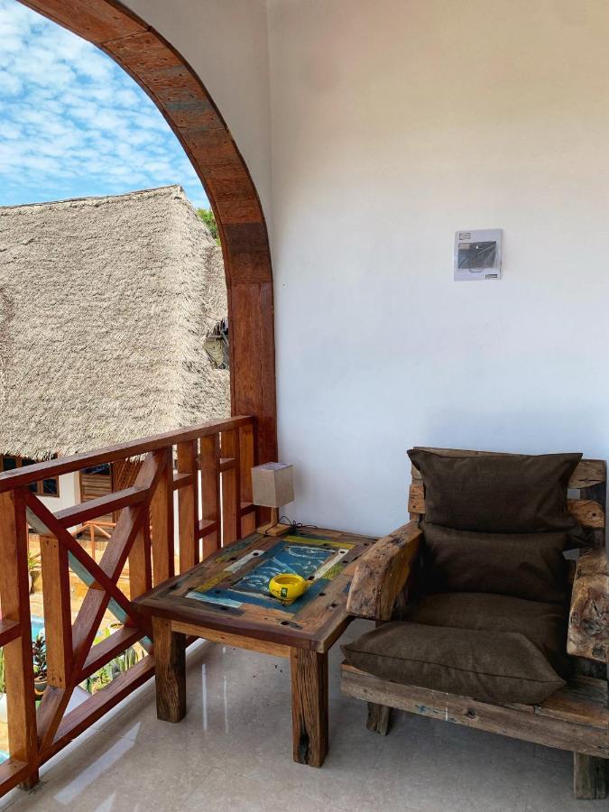 Utulivu Bungalow Нунгви Экстерьер фото