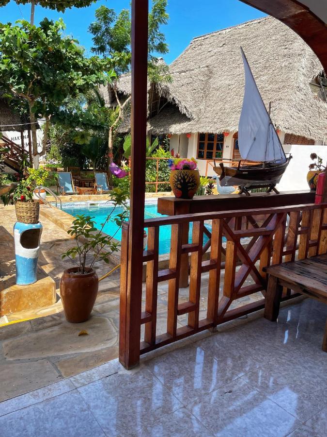 Utulivu Bungalow Нунгви Экстерьер фото