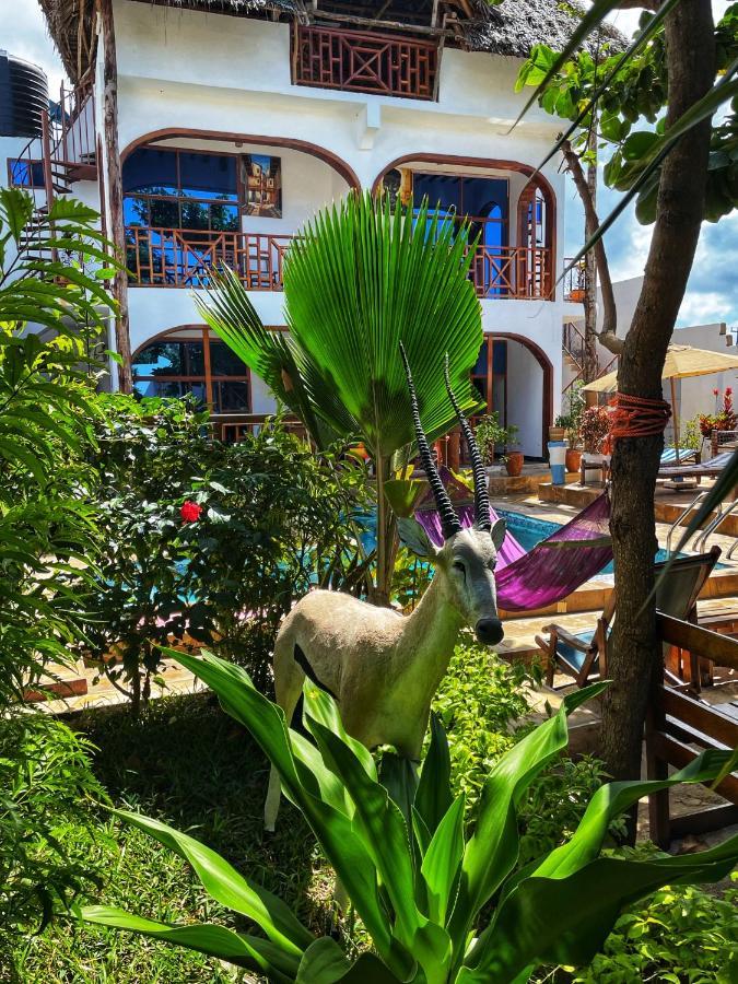 Utulivu Bungalow Нунгви Экстерьер фото