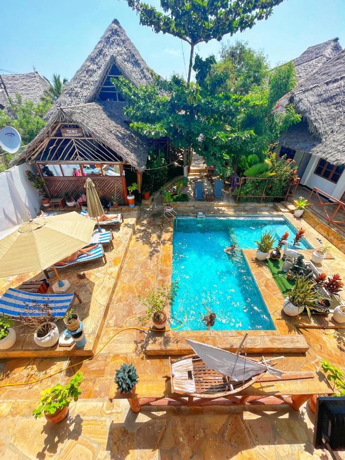 Utulivu Bungalow Нунгви Экстерьер фото